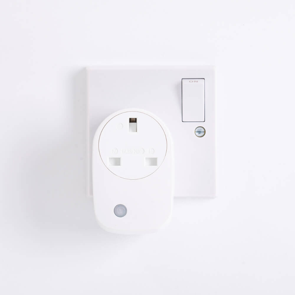 Front View of Genius Smart Plug in Socket